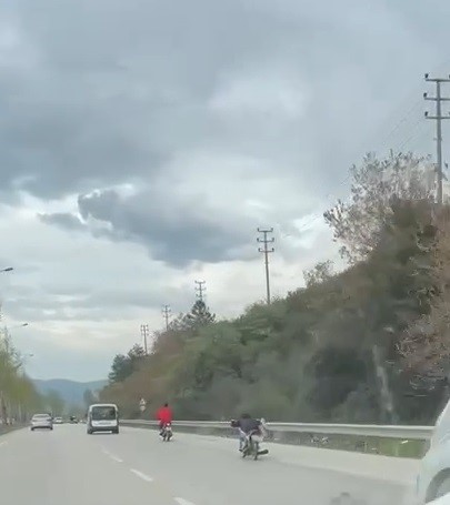 Bursa'da motosiklet üzerinde canını hiçe saydı