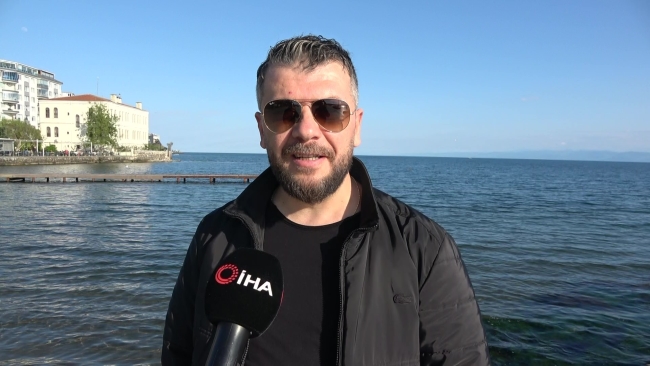 Telefonunu kurtarmak için arkadaşı denize sarkıttı