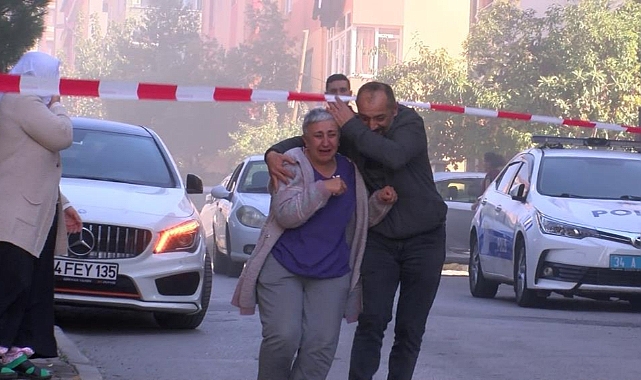 Yanan iş yerini gözyaşlarıyla izledi