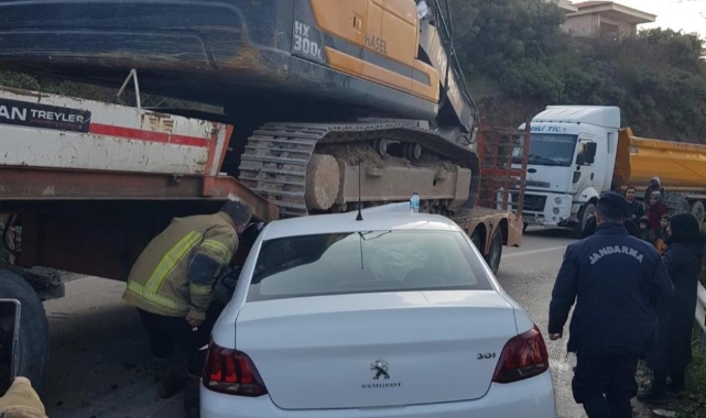 TIR'ın altına giren araçtan yaralı çıktılar