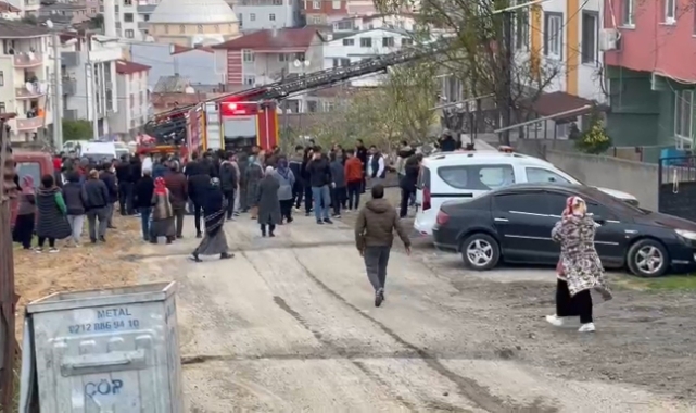 Araç lastikleri yanarken, bina sakinleri kavgaya tutuştu
