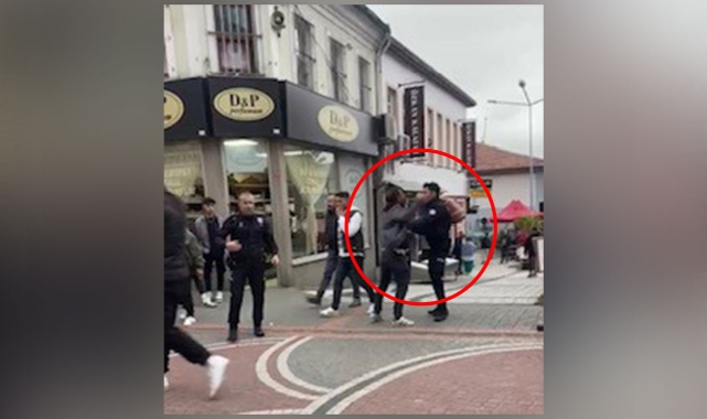 Kavgaya müdahale eden polise yumruk attı!