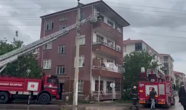 Evini yakan kadını itfaiye ekipleri kurtardı