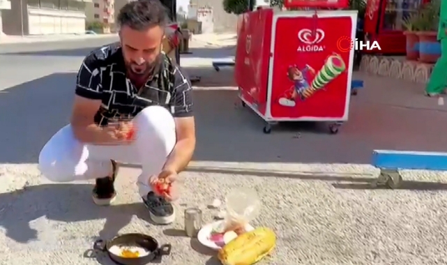 Güneşte kızarttığı yumurtayı yedi!