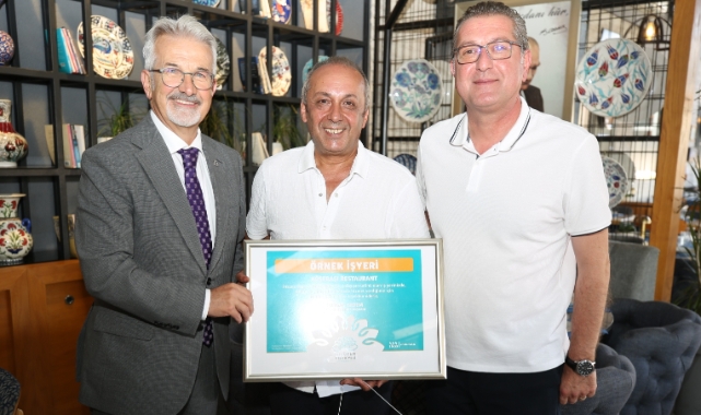 Örnek işletme belgesini başkanlar verdi