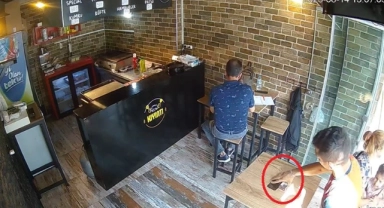 Bursa'da hırsız saniyeler içinde telefonu çaldı