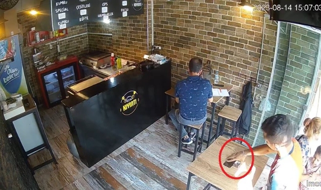 Bursa'da hırsız saniyeler içinde telefonu çaldı