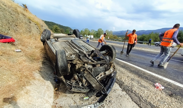 Takla atan otomobildeki 3 kişi yaralandı