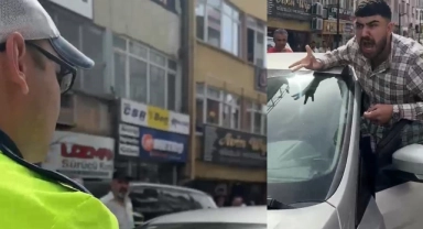 Aracını polisin üzerine sürdü, sonra bağırıp araç camına vurdu