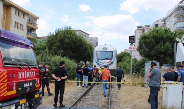 Trenin altında kalan kalan yaşlı kadın hayatını kaybetti