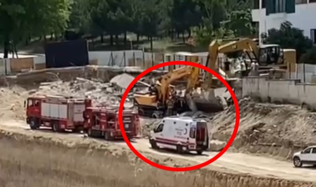 İstinat duvarı iş makinasının üzerine devrildi