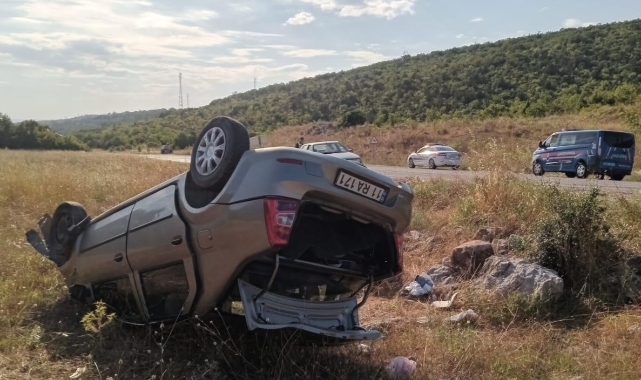 Takla atan otomobil şarampole yuvarlandı