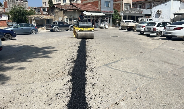 Yenişehir'de bozuk yollar tamir ediliyor