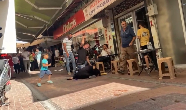 Hamile kadını sokak ortasında öldüresiye dövdü!