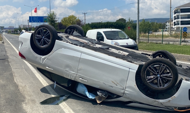 Ters dönen otomobilden burnu bile kanamadan çıktı