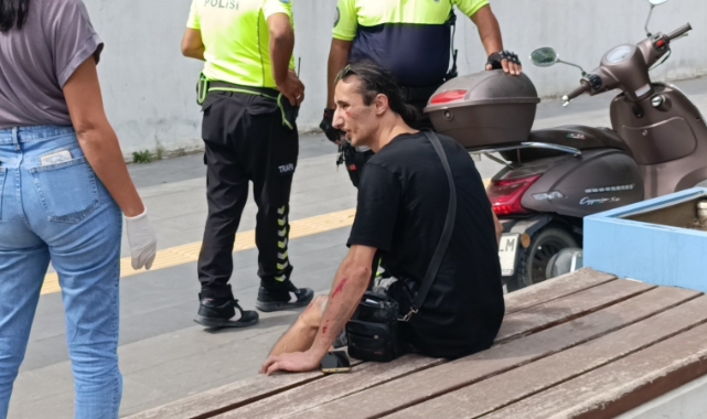 Araçlara çarpmamak için motosikletini devirdi
