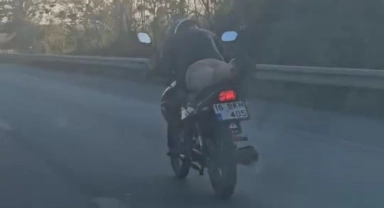 Bursa'da sürücü motosikleti yatarak kullandı