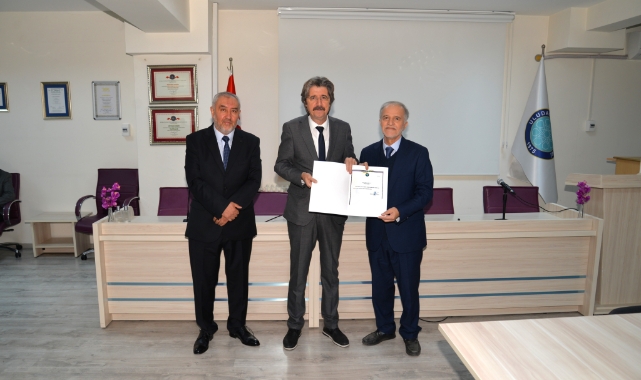 BUÜ İlahiyat Fakültesi'nde bayrak değişimi