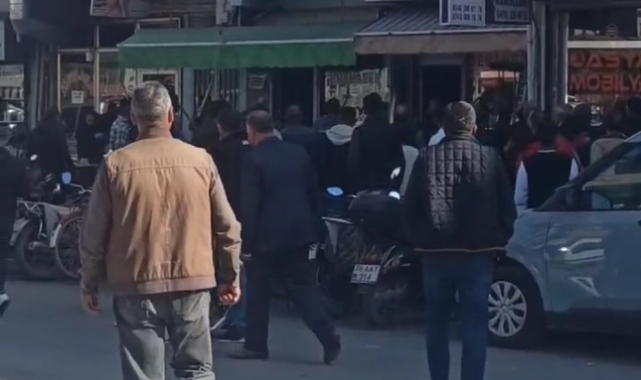 Husumetli aileler arasında sandalyeli kavga!