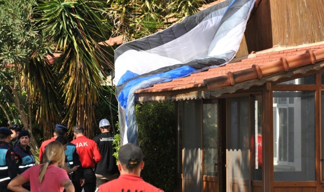 İsviçreli paraşütçü karakol binasının çatısına düştü   