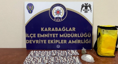 İzmir'de uyuşturucuyu çöpe atan genç, polislere yakalandı