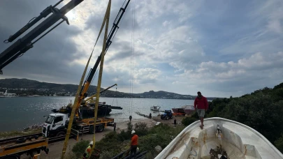 İzinsiz bırakılan tekneler vinçle kaldırıldı