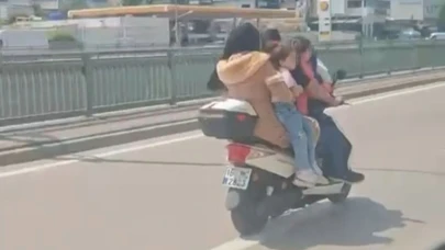 Bursa’da 5 kişilik ailenin tehlikeli motosiklet yolculuğu