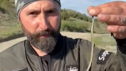 Kütahya'da motosiklet tutkunundan yavru yılan uyarısı