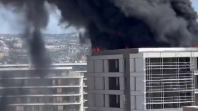 Bursa'da 8 katlı binanın en üst katı alev alev yandı