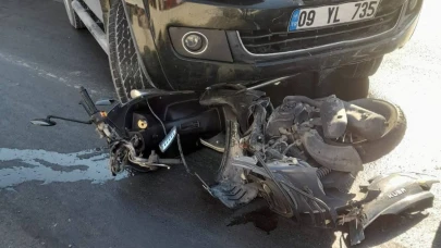 Motosiklet sürücüsü metrelerce sürüklendi