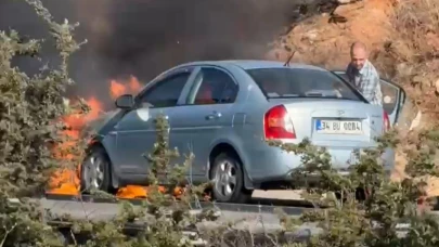 Bursa'da otomobili alev alan sürücü canı pahasına mücadele etti