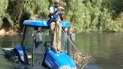 Çiftçi traktörüyle nehirde mahsur kaldı!