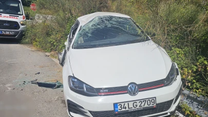 Taklalar atan otomobil uçuruma yuvarlanmaktan son anda kurtuldu