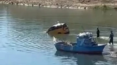 El freni indirilen taksi baraj sularına düştü