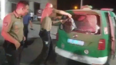 Önce polise direnip zorluk çıkardı, sonra polis aracının camını kırdı