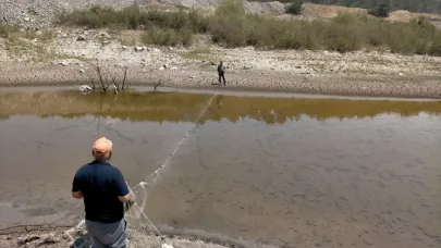 Balıklar ölmesin diye zamanla yarıştılar