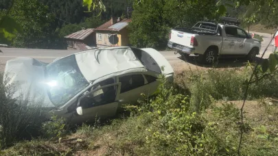 Virajı alamayan otomobil şarampolde takla attı