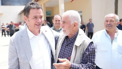 Yangınla mücadele eden dağ yöresi, hayır sofrasında kenetlendi