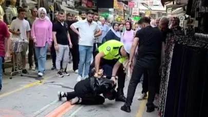 Yaz ortasında montu şüphe uyandırdı, üzerinden kurusıkı tabanca çıktı