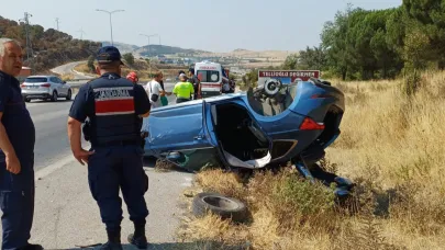 Balıkesir'de ters dönen otomobilden sürücü kurtarıldı