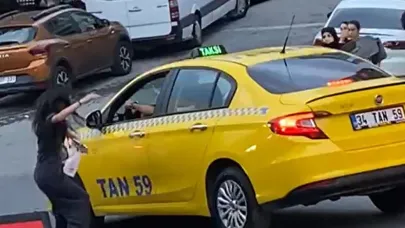 Genç kıza yumruk atan taksici böyle görüntülendi