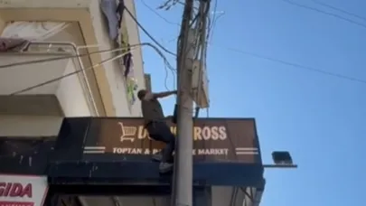 Elektrik akımına kapılıp direkten düştü