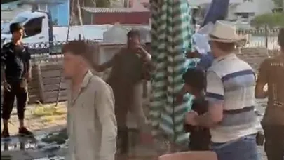 Pazar yerinde 3 kişi bir genci vahşice dövdü